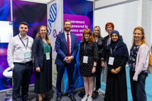 Cabinet Secretary Simon Case with members of the GSE team and speakers