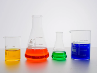 Beakers filled with different coloured liquids